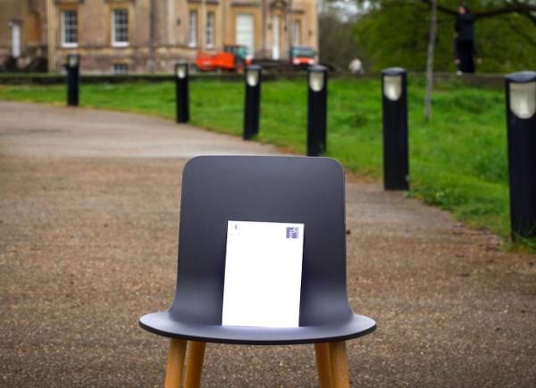 A chair with an envelope on it at Newton Park campus